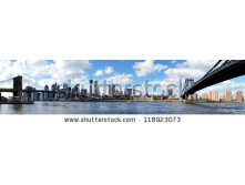 Stock-photo-panoramic-view-of-manhattan-with-brooklyn-bridge-and-manhattan-bridge-seen-from-brooklyn-bridge-118923073.jpg