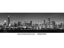 Stock-photo-panoramic-view-of-chicago-skyline-at-night-in-black-and-white-169625504.jpg