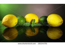 Stock-photo-lemons-and-limes-on-dark-background-182244701.jpg