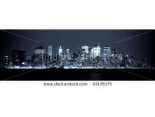 Stock-photo-new-york-panoramic-view-of-manhattan-skyline-by-night-97178375.jpg