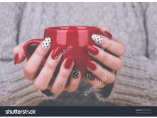 Stock-photo-manicure-beauty-treatment-photo-of-nice-manicured-woman-fingernails-very-nice-feminine-nail-art-259169561.jpg