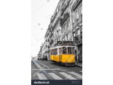 Stock-photo-the-number-tram-in-motion-blurr-running-through-lisbon-portugal-177000068.jpg