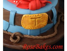 Belt-Buckle-on-Cowboy-Cake-300x247.jpg