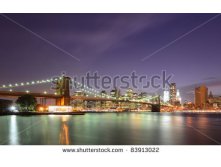 stock-photo-brooklyn-bridge-and-lower-manhattan-skyline-in-new-york-city-83913022.jpg