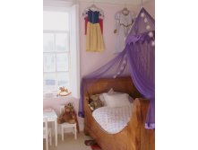 small-girls-room-with-a-canopy-over-the-bed.jpg