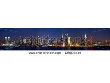 Stock-photo-manhattan-skyline-panorama-with-times-square-lights-at-dusk-new-york-city-129023246.jpg