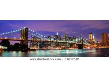 Stock-photo-new-york-city-brooklyn-bridge-and-manhattan-skyline-night-scene-over-hudson-river-54652672.jpg