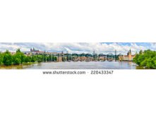 Stock-photo-panorama-in-prague-with-charles-bridge-and-hradcany-hill-czech-republic-220433347.jpg