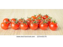 Stock-photo-panorama-of-fresh-cherry-tomatoes-on-bamboo-background-123440179.jpg