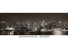 Stock-photo-midtown-manhattan-skyline-in-black-and-white-at-dusk-panorama-over-hudson-river-221326303.jpg