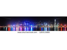 Stock-photo-hong-kong-city-skyline-at-night-over-victoria-harbor-with-clear-sky-and-urban-skyscrapers-128313989.jpg