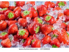 Stock-photo-fresh-ripe-strawberry-with-ice-fruit-background-157188602.jpg