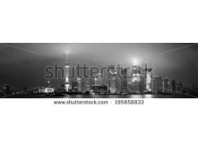 Stock-photo-shanghai-skyline-panorama-in-black-and-white-at-night-195858833.jpg