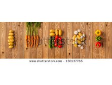 Stock-photo-vegetables-on-a-wooden-background-panorama-150137765.jpg