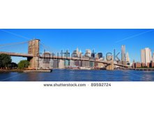 Stock-photo-new-york-city-manhattan-skyline-panorama-with-brooklyn-bridge-and-skyscrapers-over-hudson-river-in-89592724.jpg