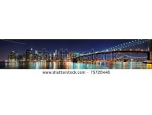 Stock-photo-new-york-city-manhattan-skyline-panorama-with-brooklyn-bridge-and-office-skyscrapers-building-in-at-75728446.jpg