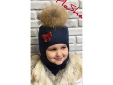 Арт. 134 Шлем зимний для девочек Шлем утепленный для девочек. Состав: верх 50% шерсть мериноса, 50% акрил утеплитель Alpolux 100 подклад 95% хлопок, 5% лайкра Помпон - натуральный финский енот (D16-18 см) Цвета: астра, флокс, белый, розовы/фуксия, серый м