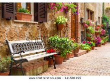 stock-photo-beautiful-street-decorated-with-flowers-in-italy-141591199.jpg