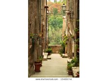 stock-photo-old-town-alley-in-tuscany-italy-134021741.jpg