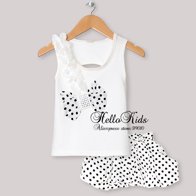 http://www.aliexpress.com/store/product/2013-New-Fashion-Baby-Girl-Clothing-Set-White-Tshirt-Black-Polka-Dot-TuTu-Skirt-For-Baby/319010_790497347.html