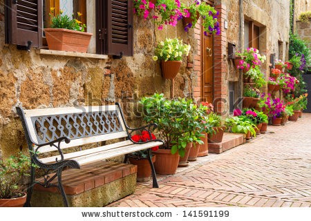 stock-photo-beautiful-street-decorated-with-flowers-in-italy-141591199.jpg