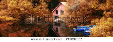 Stock-photo-panorama-landscape-stunning-autumn-scene-boat-lake-and-boathouse-213037507.jpg