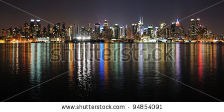 Stock-photo-new-york-city-manhattan-midtown-skyline-panorama-at-night-with-lights-reflection-over-hudson-river-94854091.jpg