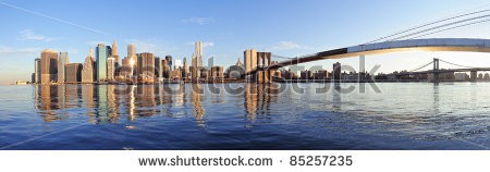 Stock-photo-brooklyn-bridge-and-manhattan-bridge-with-lower-manhattan-skyline-panorama-over-east-river-in-new-85257235.jpg