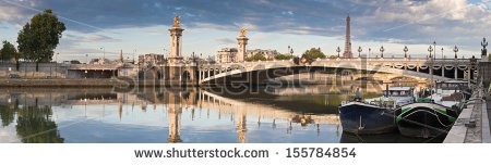 Stock-photo-stunning-pont-alexandre-iii-bridge-spanning-the-river-seine-decorated-with-ornate-art-155784854.jpg