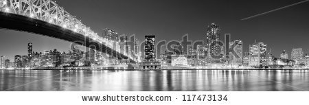 Stock-photo-queensboro-bridge-over-new-york-city-east-river-black-and-white-at-night-with-river-reflections-and-117473134.jpg