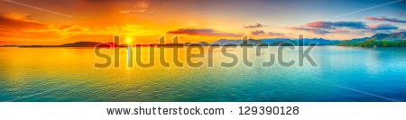 Stock-photo-sunrise-over-the-sea-panorama-129390128.jpg