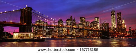 Stock-photo-panorama-of-brooklyn-bridge-east-river-and-manhattan-at-sunset-with-lights-and-reflections-new-157713185.jpg