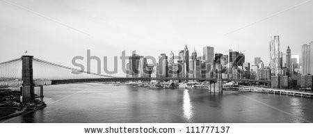 Stock-photo-new-york-city-skyline-with-brooklyn-bridge-and-lower-manhattan-view-in-early-morning-sun-light-111777137.jpg