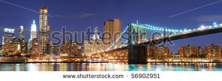 Stock-photo-new-york-city-manhattan-skyline-panorama-with-brooklyn-bridge-and-office-skyscrapers-building-in-at-56902951.jpg