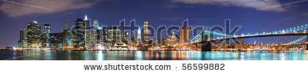 Stock-photo-new-york-city-manhattan-skyline-panorama-with-brooklyn-bridge-and-office-skyscrapers-building-in-at-56599882.jpg