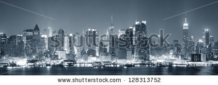 Stock-photo-new-york-city-manhattan-midtown-skyline-black-and-white-at-night-with-skyscrapers-lit-over-hudson-128313752.jpg