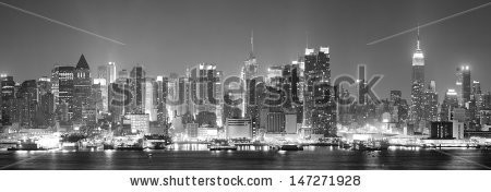 Stock-photo-new-york-city-manhattan-midtown-skyline-black-and-white-at-night-with-skyscrapers-lit-over-hudson-147271928.jpg