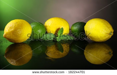 Stock-photo-lemons-and-limes-on-dark-background-182244701.jpg