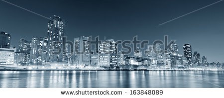 Stock-photo-new-york-city-manhattan-midtown-skyline-black-and-white-at-night-over-east-river-163848089.jpg