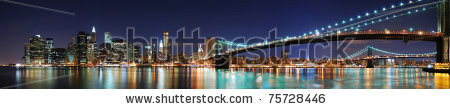 Stock-photo-new-york-city-manhattan-skyline-panorama-with-brooklyn-bridge-and-office-skyscrapers-building-in-at-75728446.jpg