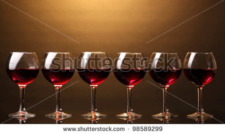 Stock-photo-wineglasses-on-brown-background-98589299.jpg