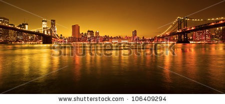 Stock-photo-manhattan-bridge-and-manhattan-skyline-at-night-106409294.jpg