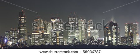 Stock-photo-tokyo-at-night-panorama-with-illuminated-skyscrapers-56934787.jpg