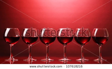 Stock-photo-wineglasses-on-red-background-107618216.jpg