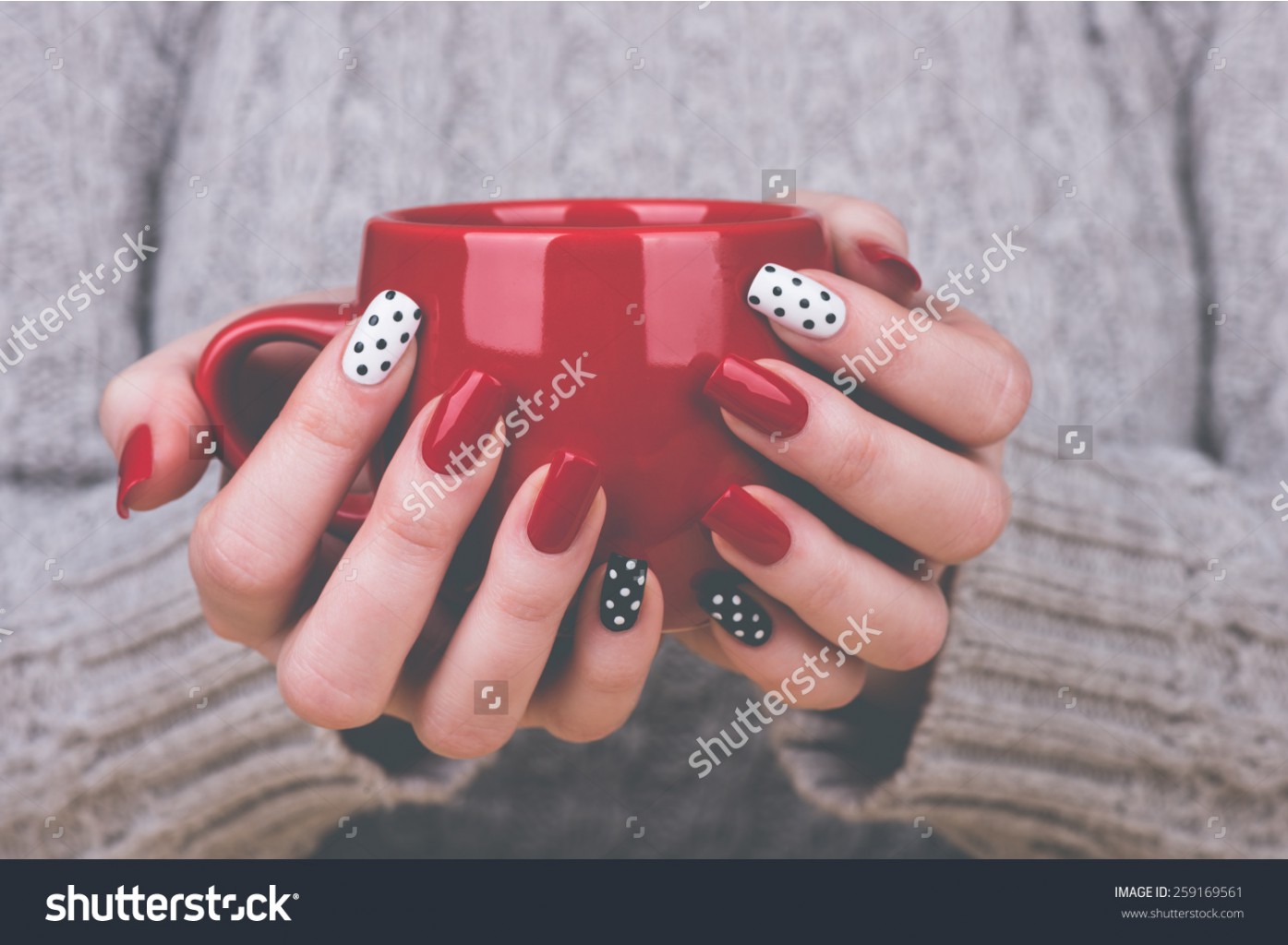 Stock-photo-manicure-beauty-treatment-photo-of-nice-manicured-woman-fingernails-very-nice-feminine-nail-art-259169561.jpg