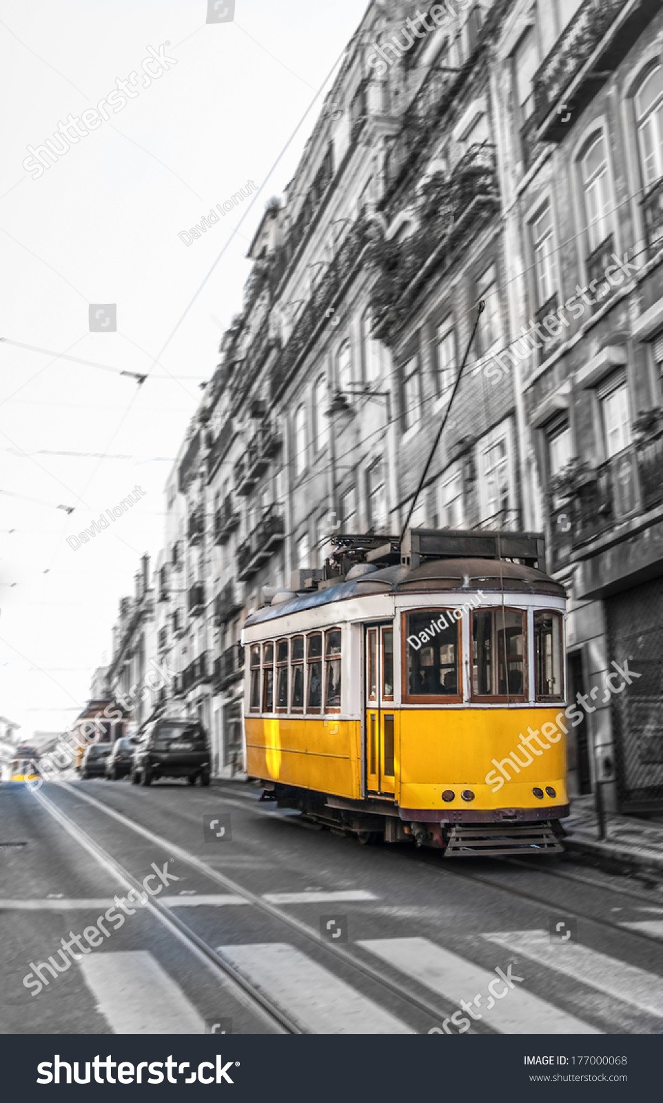 Stock-photo-the-number-tram-in-motion-blurr-running-through-lisbon-portugal-177000068.jpg